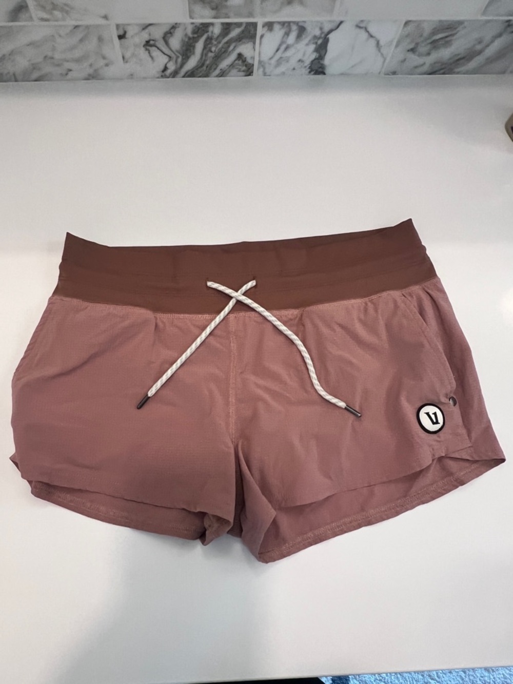 Vuori Two-Tone Mauve Athletic Shorts with Brown Waistband